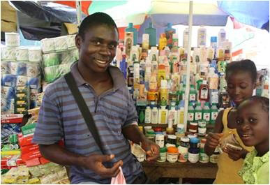 Liberia-Man & children at pharmacy