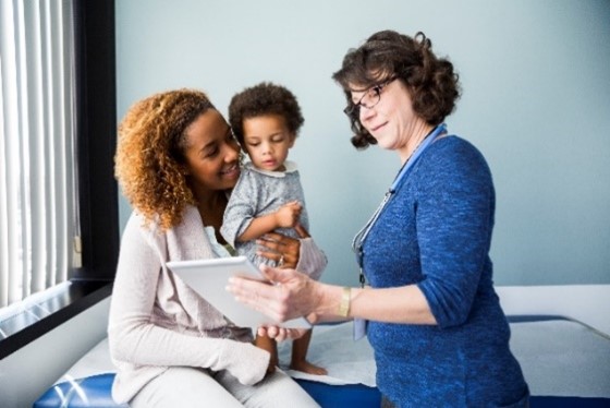 doctor helping patient