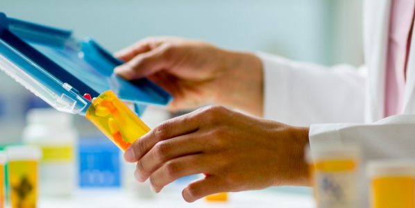 pharmacist dispensing pills