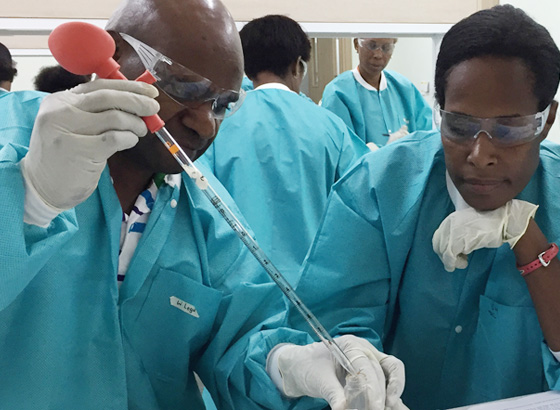 lab workers in Papua New Guinea